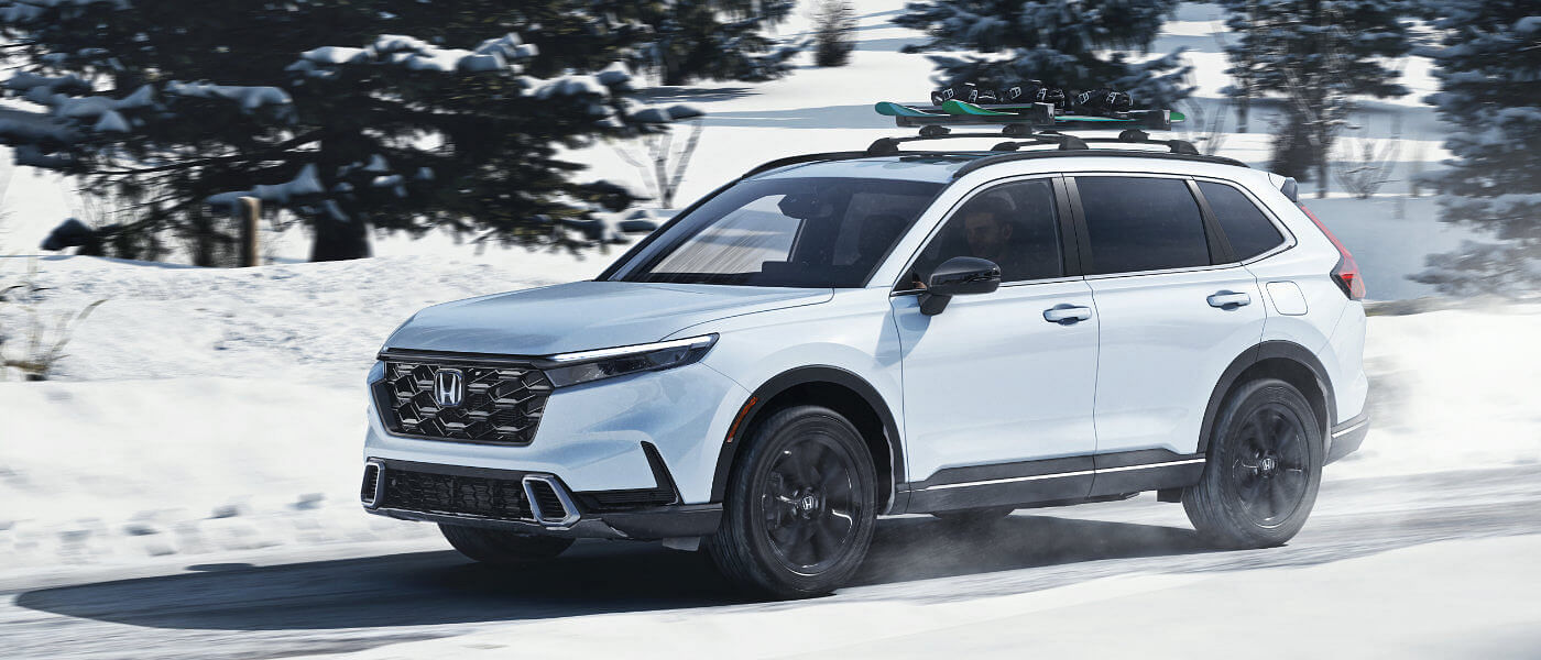 2024 Honda CR-V driving in the snow