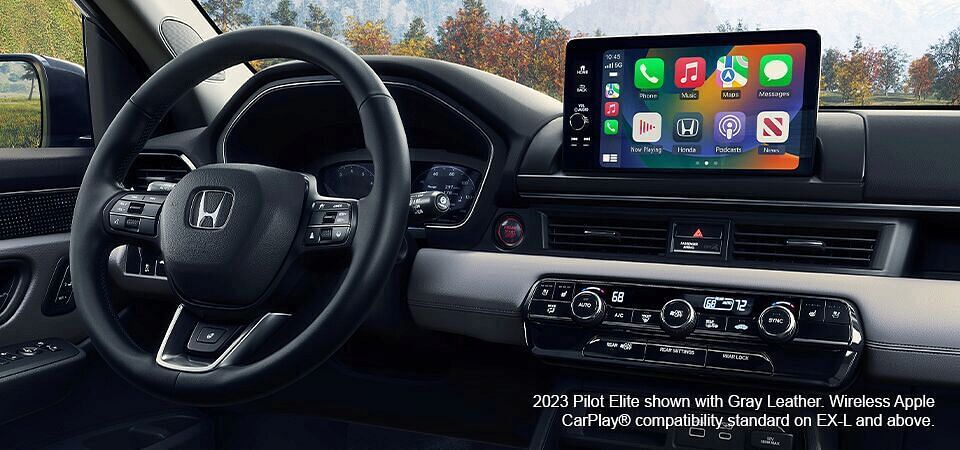 2023 Honda Pilot Elite with Gray Leather interior. Wireless Apple CarPlay compatibility standard on EX-L and above.